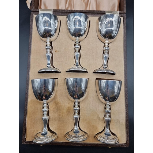 555 - A cased set of six limited edition silver Queen Elizabeth II commemorative goblets, by Garrard ... 