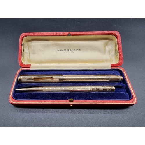 674 - A vintage 14ct gold Mabie, Todd & Co two pen set, comprising: a 'Swan' fountain pen, with 14ct n... 