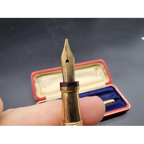 674 - A vintage 14ct gold Mabie, Todd & Co two pen set, comprising: a 'Swan' fountain pen, with 14ct n... 