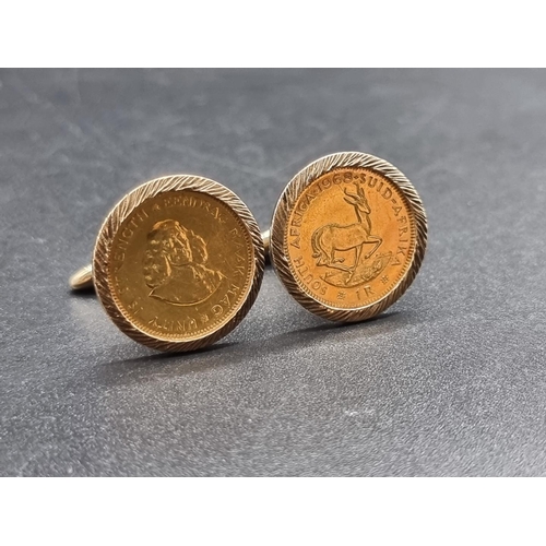 680 - A pair of 9ct gold cufflinks, each set South Africa one rand gold coin, dated 1968/71, gross weight ... 