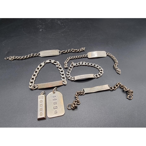 734 - Five various silver identity bracelets; together with a silver key fob and a silver ingot pendant.... 