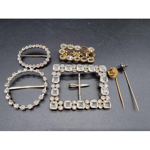 739 - Three vintage buckles; together with a metal brooch; a citrine stick pin; and a diamond stick pin. (... 