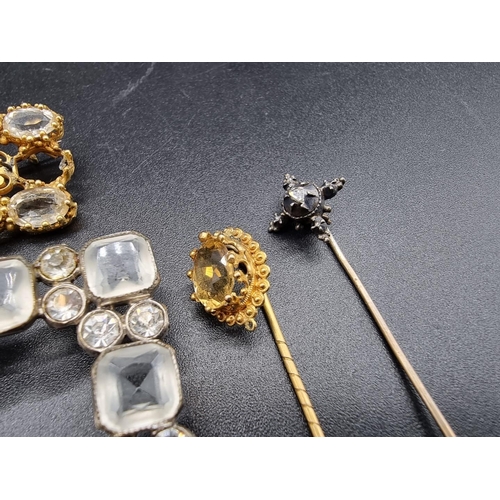 739 - Three vintage buckles; together with a metal brooch; a citrine stick pin; and a diamond stick pin. (... 