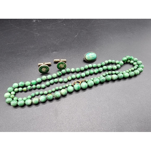 743 - A graduated jadeite bead necklace, 80cm; together with a pair of Chinese jade set gold plated sterli... 