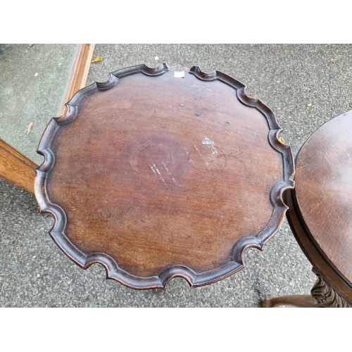 1021 - A mahogany oval occasional table; together with a piecrust tripod table.