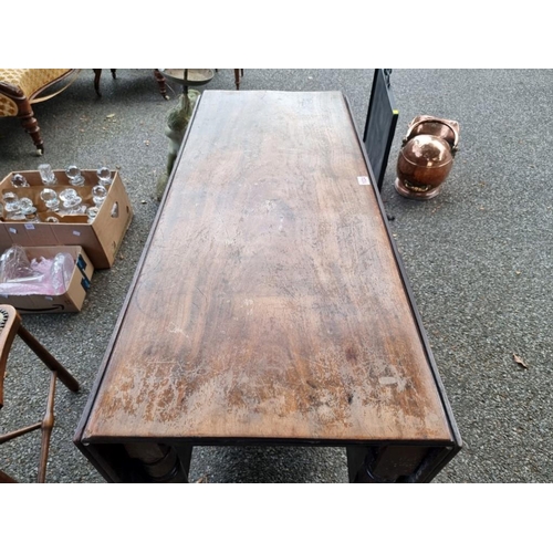 1024 - An antique mahogany dropleaf table, 107cm wide x 72cm high. 