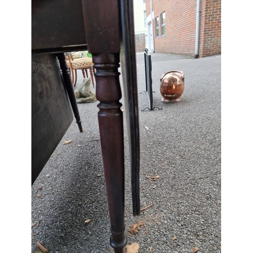 1024 - An antique mahogany dropleaf table, 107cm wide x 72cm high. 