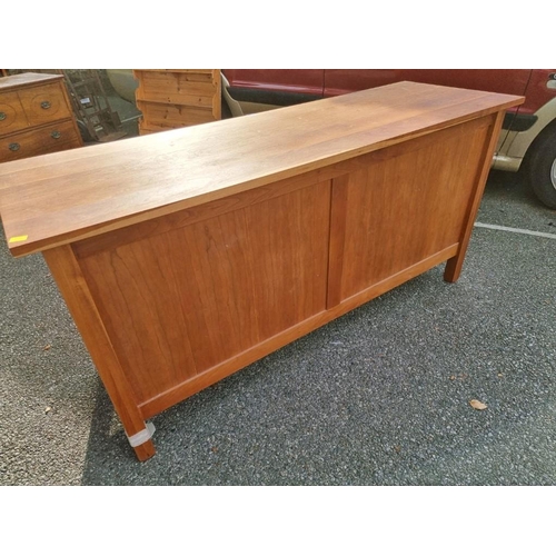 1042 - A modern hardwood sideboard, 155cm wide x 51cm deep x 77cm high.