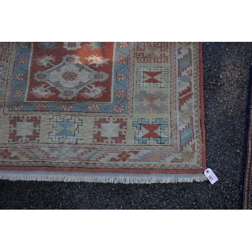 1071 - A Caucasian rug, having five central medallions, 207 x 124cm; together with a smaller example, havin... 