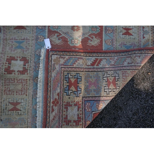 1071 - A Caucasian rug, having five central medallions, 207 x 124cm; together with a smaller example, havin... 