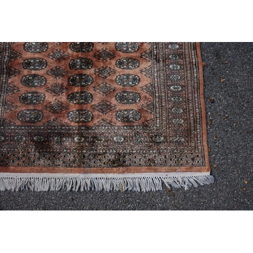 1072 - A Bokhara rug, having repeated decoration to central field, 193 x 129cm.