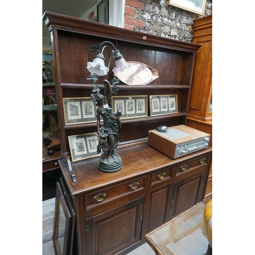 1083 - A George III oak dresser and rack, 155cm wide.