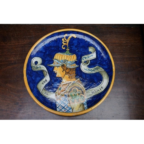 1100 - A maiolica plate, 25.5cm diameter; together with a Rye pottery figure; a pair of Burleigh ware jugs,... 