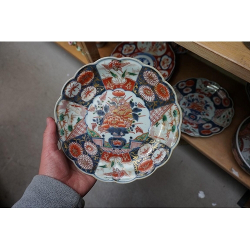 1107 - A collection of Japanese Imari plates and bowls. (8)