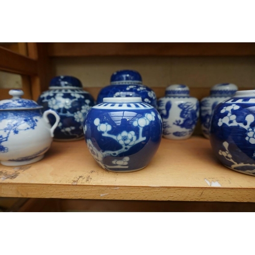 1110 - A collection of Chinese and other blue & white jars and similar, some with covers, largest 15cm ... 