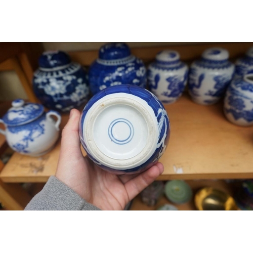 1110 - A collection of Chinese and other blue & white jars and similar, some with covers, largest 15cm ... 