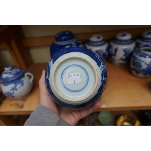 1110 - A collection of Chinese and other blue & white jars and similar, some with covers, largest 15cm ... 