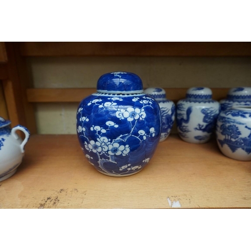 1110 - A collection of Chinese and other blue & white jars and similar, some with covers, largest 15cm ... 