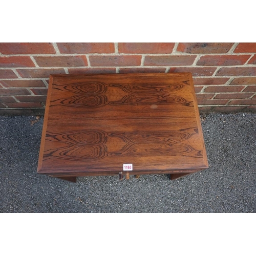 1163 - A vintage Danish rosewood metamorphic nest of three folding occasional tables, labelled 'Silkeborg',... 