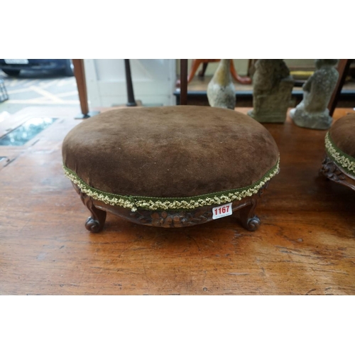 1167 - A pair of Victorian carved walnut and upholstered oval footstools, 38cm wide. ... 