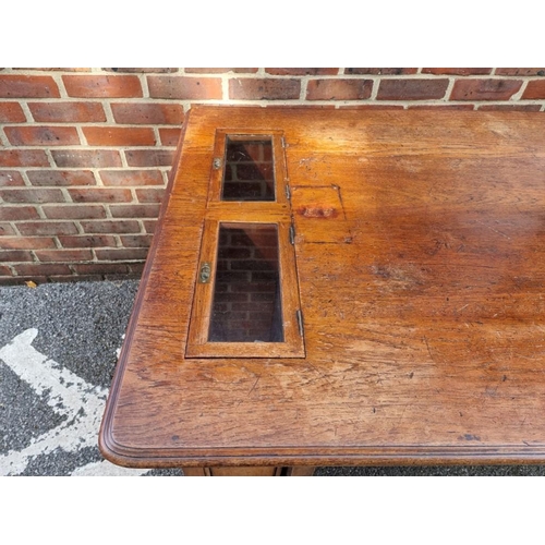 1168 - An unusual late Victorian mahogany underwriter's desk, with two pairs of opposing frieze drawers, an... 