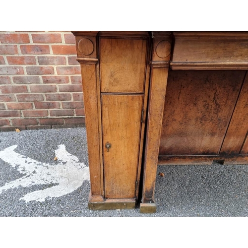 1168 - An unusual late Victorian mahogany underwriter's desk, with two pairs of opposing frieze drawers, an... 