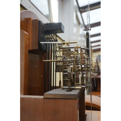 1172 - A reproduction yew longcase clock, striking on eight straight gongs, 195cm high, with pendulum ... 