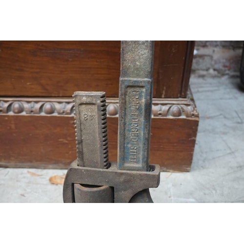 1190 - A large Stillson railway or pipe wrench; together with a large pair of bolt cutters; and one other. ... 