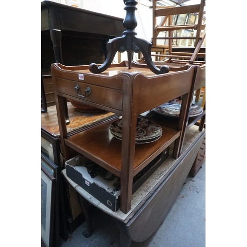 1200 - A pair of reproduction mahogany tray top two tier occasional tables, each with frieze drawer, the to... 