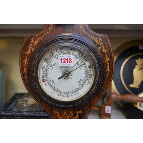 1218 - A late 19th century rosewood and inlaid aneroid banjo barometer, 69cm high, (s.d).