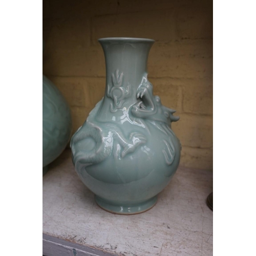 1223 - Three Chinese celadon vases, largest 38cm high, (two drilled).