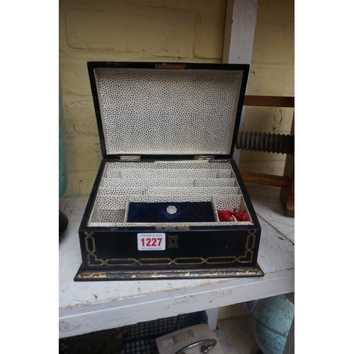 1227 - A Victorian papier mache casket, 22.5cm wide.