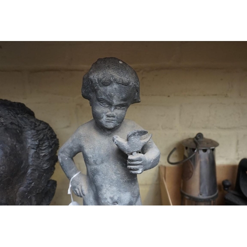 1236 - A lead figure of a boy, 40.5cm high. 