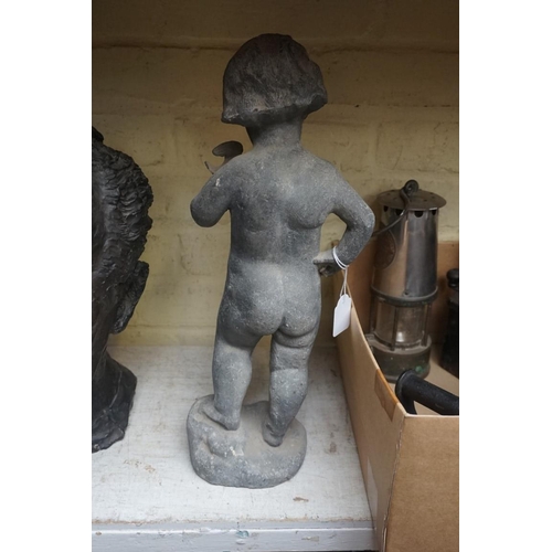 1236 - A lead figure of a boy, 40.5cm high. 