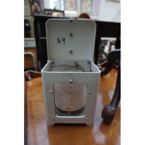 1238 - A brass lantern style timepiece; together with a thermograph.... 