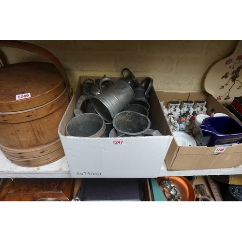 1247 - A collection of old pewter tankards and measures. (11)