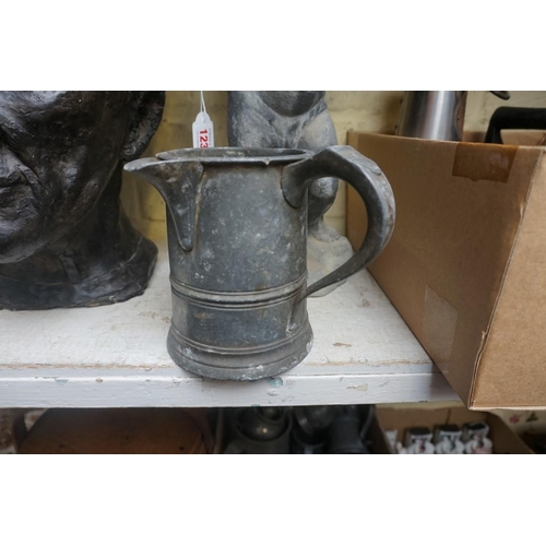 1247 - A collection of old pewter tankards and measures. (11)