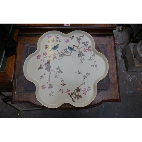 1249 - A late 19th century Continental porcelain cabaret tray, 42.5cm diameter.... 