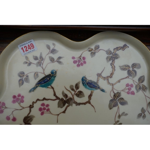 1249 - A late 19th century Continental porcelain cabaret tray, 42.5cm diameter.... 