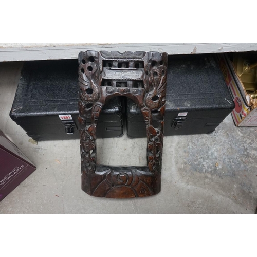 1260 - A mixed lot of Eastern carved wood, to include three book slides; a Chinese bell stand etc. (7) ... 