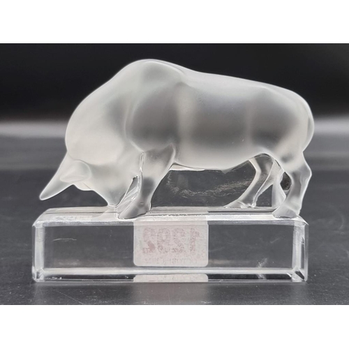 1292 - A Lalique 'Taureau' clear and frosted glass bull, 10.5cm long. 