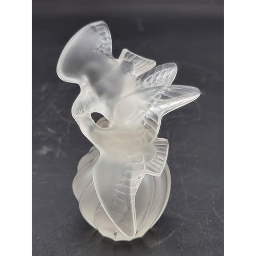 1295 - A Lalique 'L'Air du Temps' frosted glass scent bottle and stopper, 10cm high.