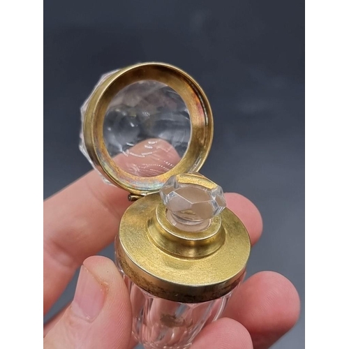 1297 - A good antique French cut glass and gilt metal mounted ovoid scent bottle, 5.5cm high, in conforming... 