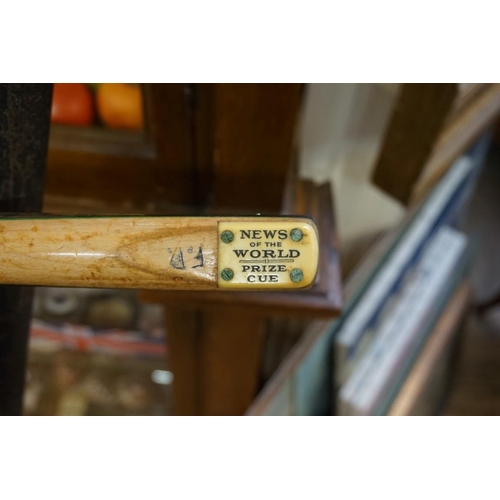 1310 - A vintage one piece billiards cue, bearing plaque inscribed 'News Of The World Prize Cue', and with ... 