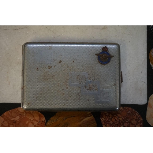 1343 - A collection of cigarette cases and compacts, to include two with RAF crest.