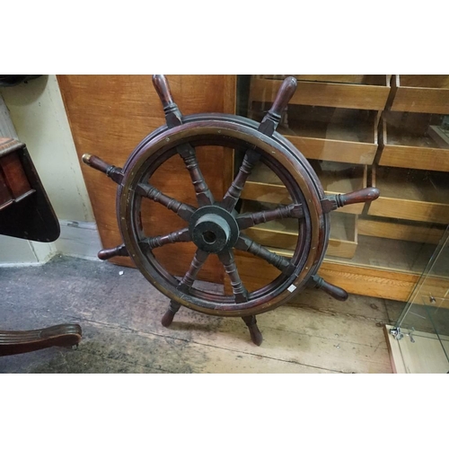 1375 - An old pine and brass ship's wheel, 92cm diameter. 