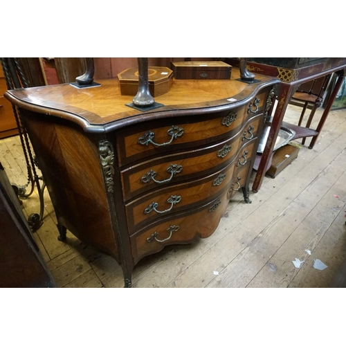 1409 - A Louis XV kingwood, line inlaid and rosewood crossbanded serpentine commode, with ormolu mounts, 11... 