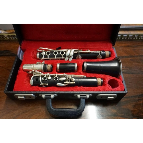 A Corton in fitted case.