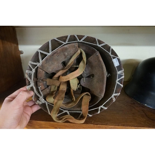 1805 - An Imperial Japanese Army Type 90 steel helmet, with liner and chin straps.