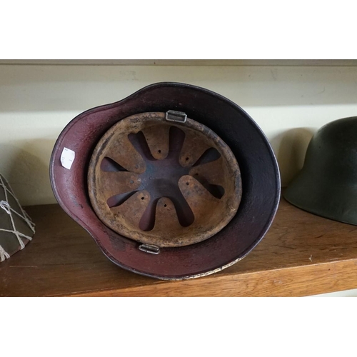 1806 - A German Third Reich M35 pattern steel helmet, bearing two decals, with liner.